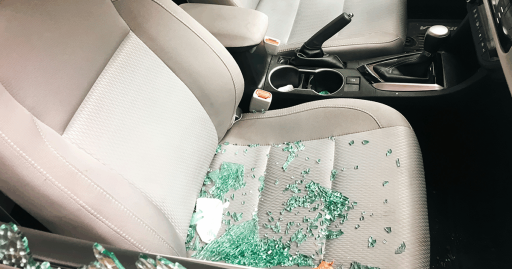An image of a works vehicle that has a window smashed