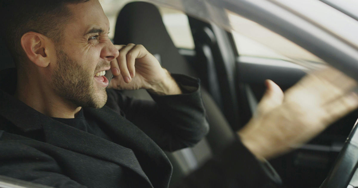 Driver sat in a vehicle getting angry and stressed